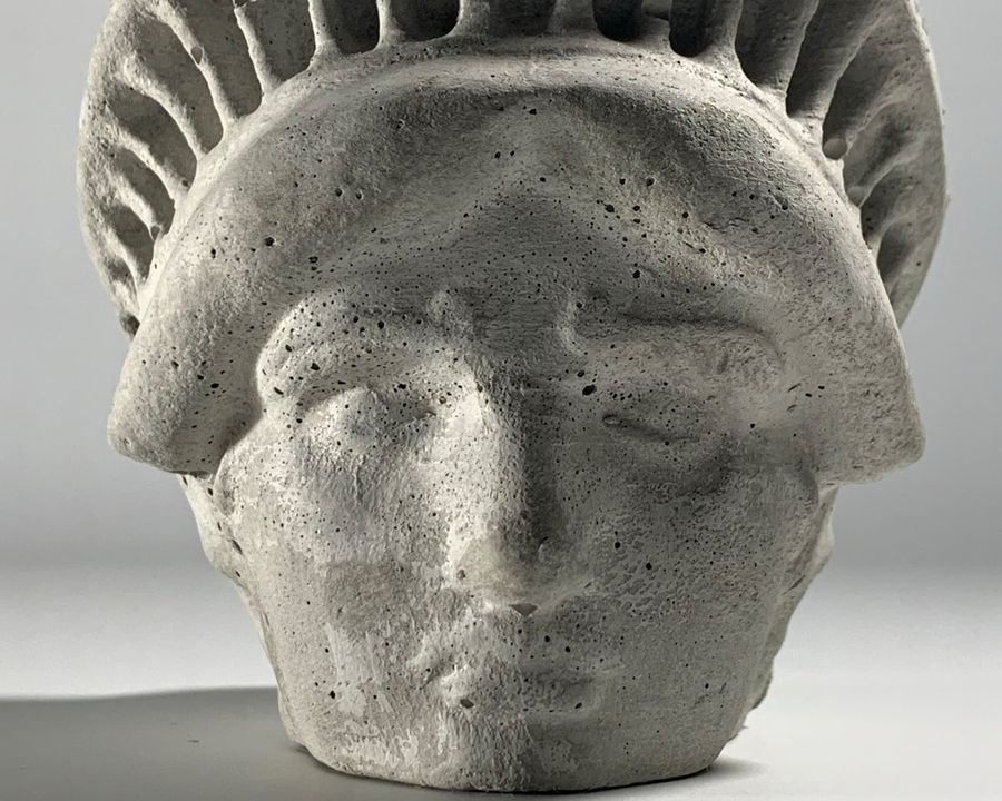 Concrete head planter of the Statue of Liberty