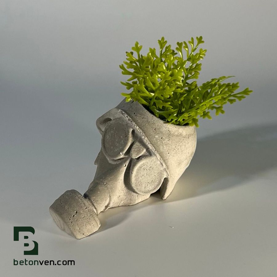 Concrete planter modelled on a virus, made during the pandemic